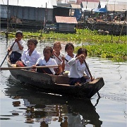 school-children-boating-tonle-sap-river-cambodia.jpg