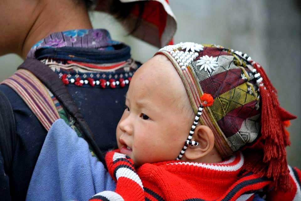 sapa-child-in-back-pack-vietnam
