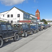 4x4s ready for tourists in Stanley.jpg