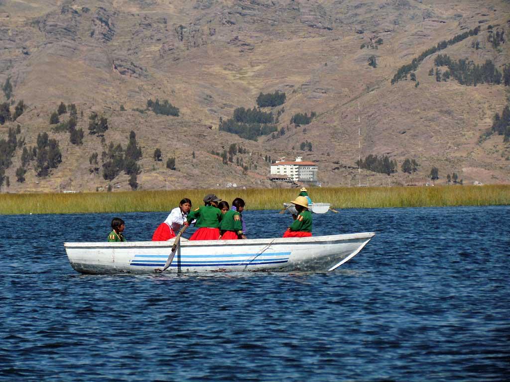 Children rowing home from school, Uros Islands, Lake Titicaca 122