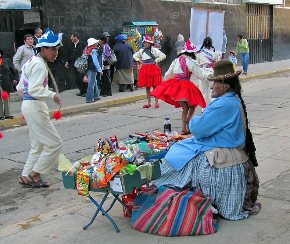 Vendor on parade route, Puno 138