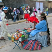 Vendor on parade route, Puno 138.jpg