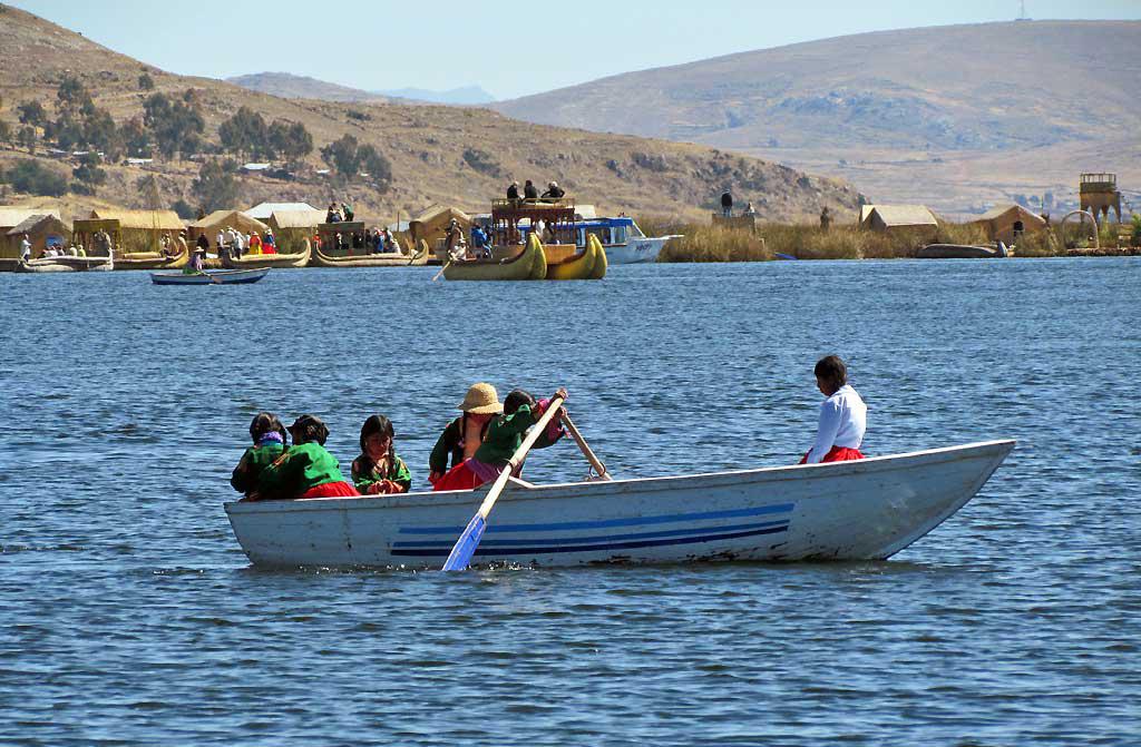 Children rowing home from school, Lake Titicaca 124