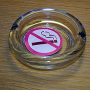 No smoking sign in an ash tray, Paris, France.jpg